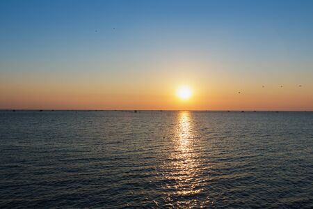 Scenic view of beautiful sunset in the seaの写真素材