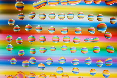 Water drops on colorful background beautifulの写真素材