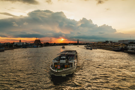 Orange sky in the evening With Boats in the river