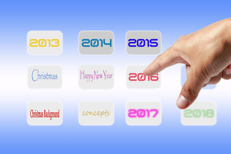 Male hand Fingers press the button touch screen in choosing new year 2016.