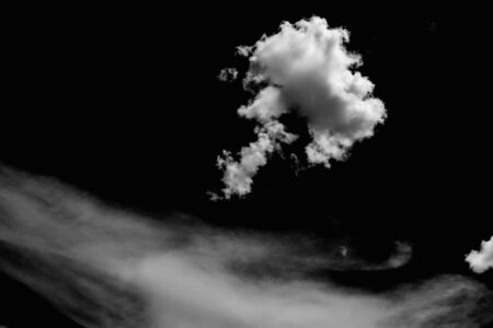The clouds white on isolated black backgroundの写真素材