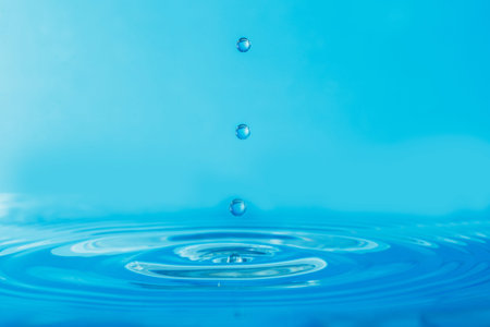 Water drops on  blue background with drops