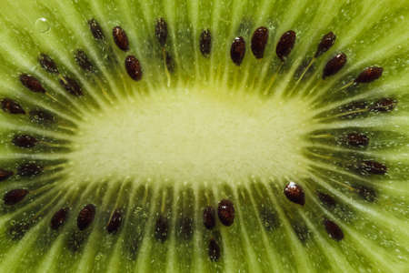 Close up used as kiwi fruit texture backgroundの写真素材
