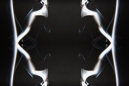 White smoke on a dark backgroundsの写真素材