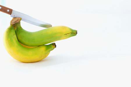 Bunch of bananas ripe on white backgroundの写真素材