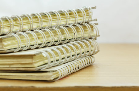 Note book old recycle with spiral on wood background