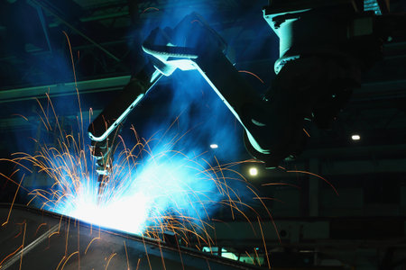 Sparks and smoke from robot welding  in industrialの写真素材