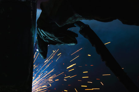 Welder of Metal Welding with sparks and smokeの写真素材