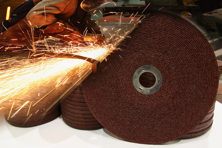 The abrasive discs  stone for metal grinding in industrial steel with sparksの写真素材