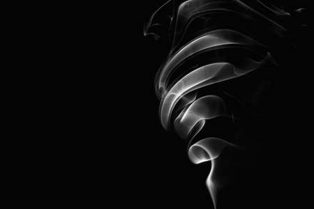 White smoke on black backgroundの写真素材