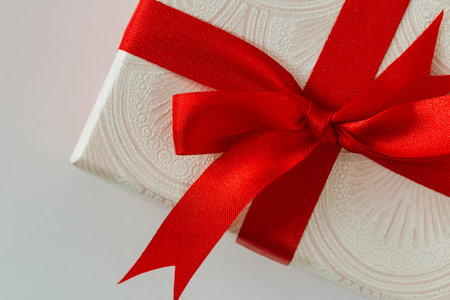Gift box with ribbon red  on white background