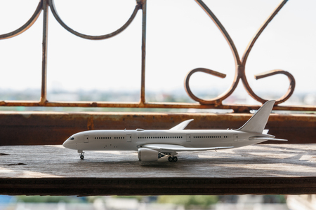 Airplane boeing model on wood backgroundの写真素材