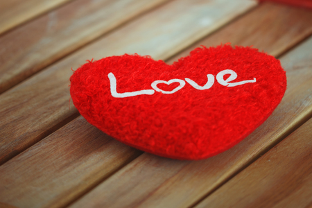 Valentine day with red heart  on wood, concept love whiteの写真素材
