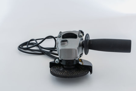 Grinding machine with cutting  wheel on white background