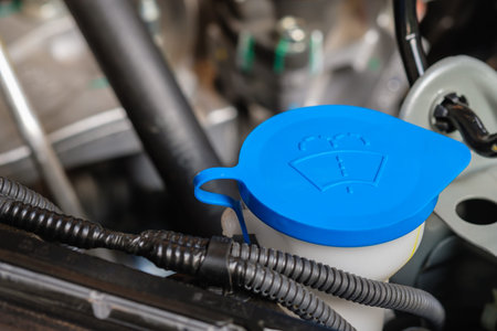 Several liquid caps inside a engine car for the  wipersの写真素材