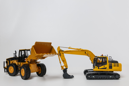 Excavator and Wheel loader model on white backgroundの写真素材