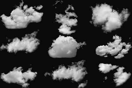 Set of clouds white fluffy on isolated elements black backgroundの写真素材