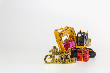 Christmas ornament and Excavator modelの写真素材