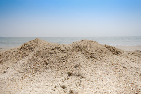Beach sand with sea and sky  and summer dayの写真素材