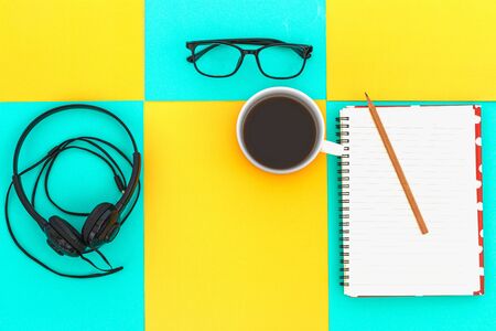 Headphones and Coffee cup a on difference colorful bright board. Music concept.Top viewの写真素材