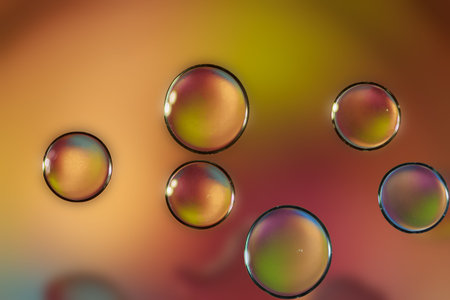 Oil color drops on a pastel background