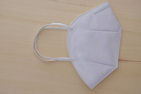 Protection respirator mask on woodenの写真素材