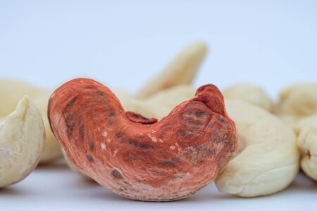 Raw Cashew nuts group on a  white backgroundの写真素材