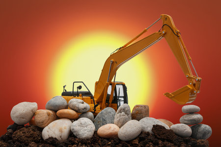 Excavators loader are digging the soil and stone in the construction site on the sun large size...
