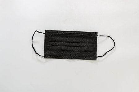 Medical mask black on white background, virus protection, pollution, virus, Flu and Health care