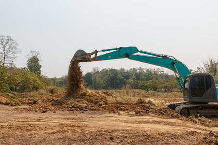 Cyan Excavators are digging the soil in the construction site location field