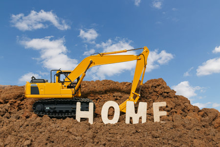 Home concept and  Excavator digging the soil In the construction site area city  on  sky  background