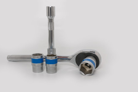 Block wrench hex with spindle on the white background