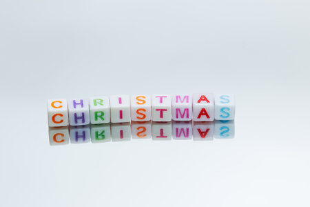 Christmas letter symbol with reflectionの写真素材