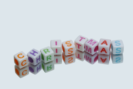 Christmas letter symbol with reflection,の写真素材