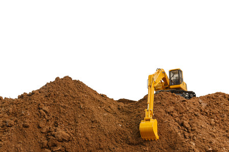 Selective focus,Crawler Excavator is digging soil in the construction site  on  isolated white...