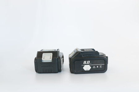 Lithium battery 8 mAh of chainsaw 11.5 finger on white background.