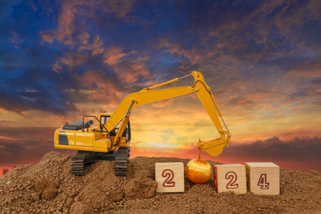 Concept Happy new year 2024,crawler excavator in construction site .on sunset  backgroundsの写真素材