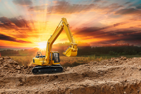 Crawler excavator with are digging the soil in the construction site on the sunset  backgroundsの写真素材