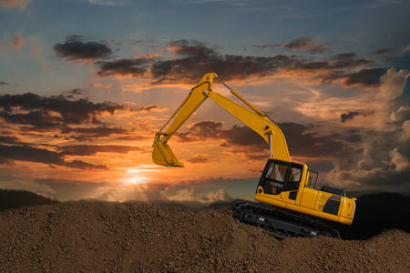 Crawler excavator with are digging the soil in the construction site on the sunset  backgroundsの写真素材