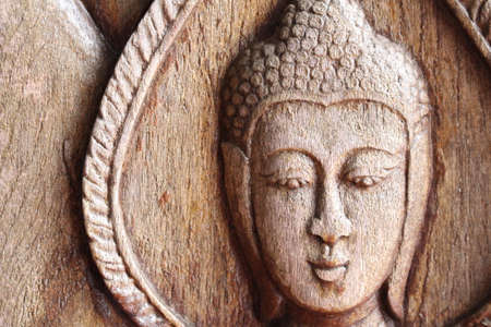 Buddha image in Thai style wood carving, Thai Culture の写真素材