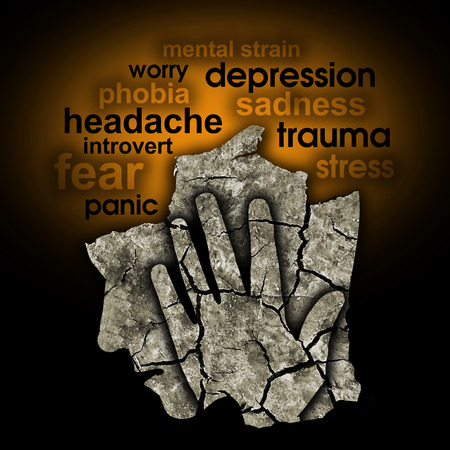 Headache Depression Psychology Concept. Stylized male head silhouette holding his head.Photo-montage with Dry cracked earth and psychological words.の写真素材
