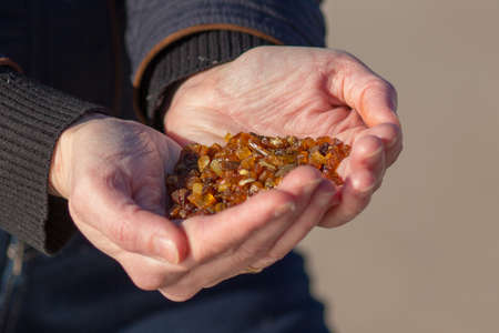 Handful of amberの写真素材