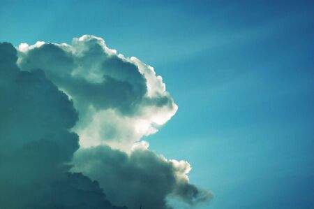 dark clouds hiding the sunの写真素材