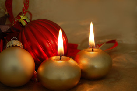     christmas ornaments and burning candles                                の写真素材