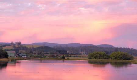 beautiful sunset over a lake の写真素材