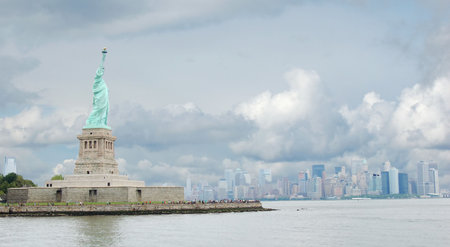 statue of liberty and manhattan skylineの写真素材