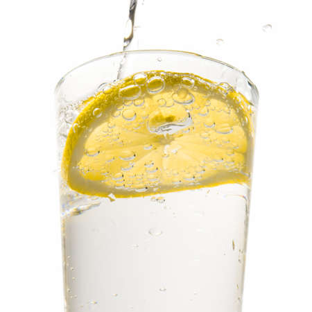 Lemonade being poured into a glassの写真素材