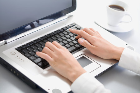 Human hands doing some computer work