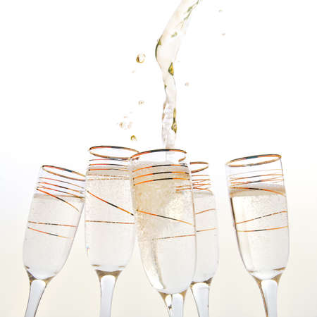Champagne flutes making a toast.の写真素材