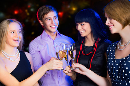Happy people relaxing together at party